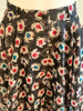 Red, blue, cream, and black floral-patterned, sheer, silk, very-full maxi-skirt. 